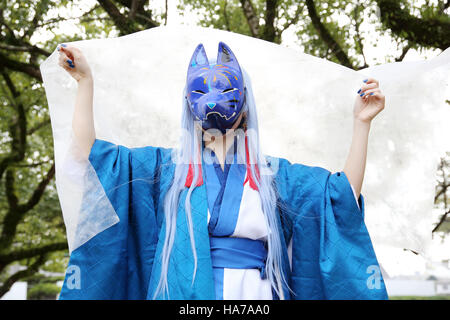 Giovane ragazza giapponese vestito in costume cosplay al Parco Mamugame-Jou Foto Stock