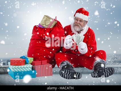 Santa conteggiare denaro Foto Stock