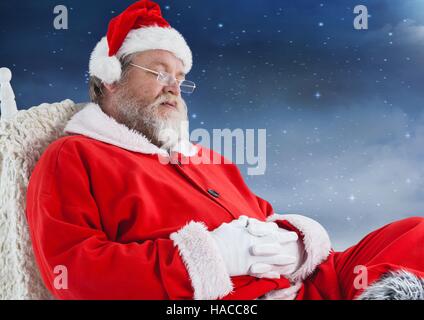 Babbo Natale seduti su una sedia e dormire Foto Stock