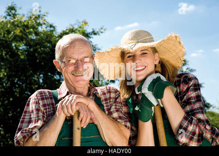 Maschio e femmina giardiniere Foto Stock