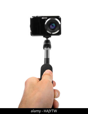 Tenendo selfie - tenere in mano monopiede con fotocamera foto Foto Stock