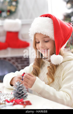 Bambina in Santa hat Foto Stock