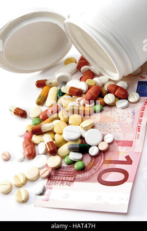 Pillole in un arco di tempo di dieci euro-bill Foto Stock