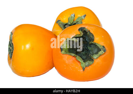 Persimmon su uno sfondo bianco succosa pochi pezzi Foto Stock