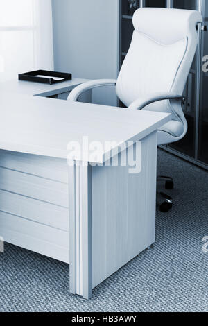 Poltroncina in un ufficio moderno Foto Stock