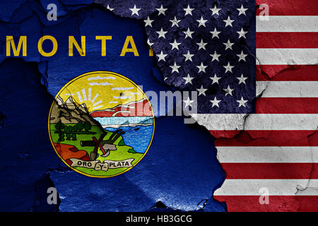 Le bandiere del Montana e USA dipinta sulla parete incrinato Foto Stock