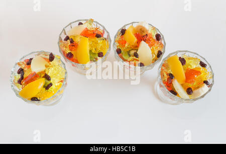Dessert colorati / frutti dolci e jelly nel recipiente Foto Stock