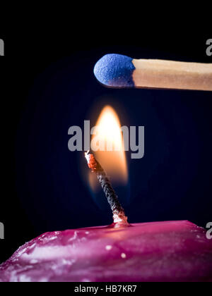 Candela con stoppino e corrispondenza Foto Stock