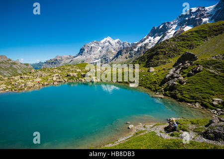 Lago Oberhorn, Hinteres Lauterbrunnental, Mönch dietro, Lauterbrunnen, Alpi svizzere Jungfrau-Aletsch, Oberland bernese Foto Stock