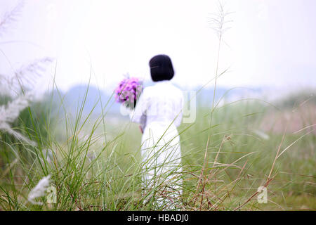 Il Vietnam donna con fiore di loto Foto Stock