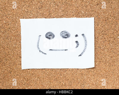 La serie di emoticon giapponese chiamato Kaomoji sulla bacheca di sughero, scomodo Foto Stock