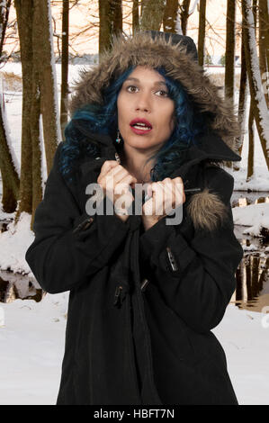 Donna in cappotto invernale Foto Stock