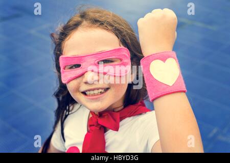 Il supereroe ragazza Cusome felicità carino Concept Foto Stock