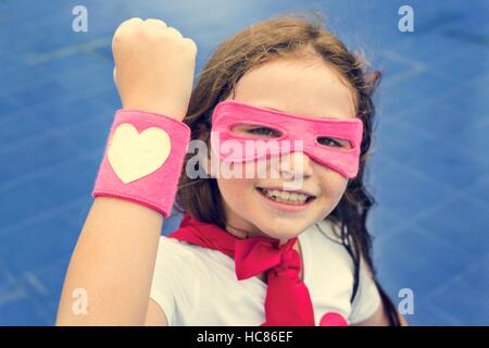 Il supereroe ragazza Cusome felicità carino Concept Foto Stock