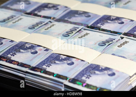 Pile di Nuovo Dollaro di Taiwan le bollette Foto Stock