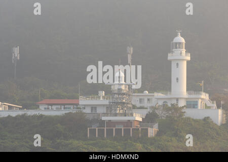 Sanji faro nella nebbia, Jeju City, Jeju Island, Corea del Sud, Asia Foto Stock