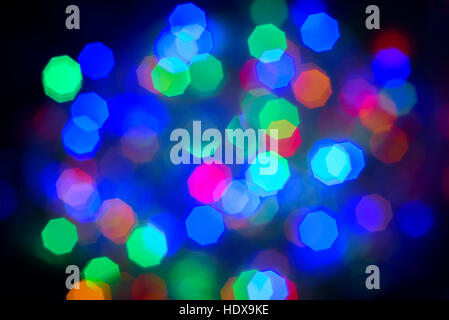 Defocussed Natale luci colorate. Foto Stock