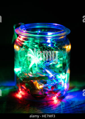 Partito in un vaso con palla da discoteca e colorate luci a led Foto Stock