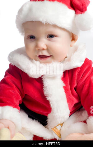 Baby boy, circa 6 mesi di età, vestito con una tuta di Santa a Natale, Foto Stock