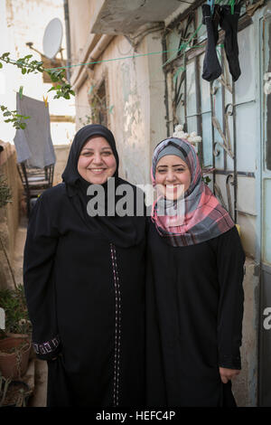 Giordana, madre e figlia - Zarqa, Giordania. Foto Stock