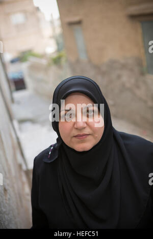 Donna giordana in Zarqa, Giordania. Foto Stock