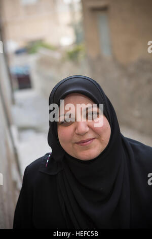 Donna giordana in Zarqa, Giordania. Foto Stock