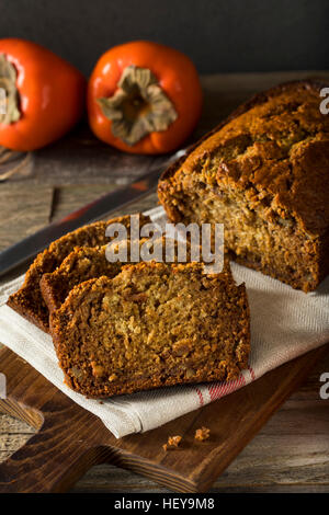 Dolci fatti in casa e Persimmon il dado pane pronto per affettare Foto Stock