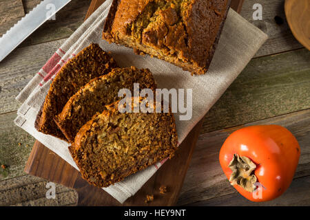 Dolci fatti in casa e Persimmon il dado pane pronto per affettare Foto Stock