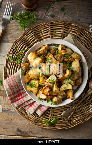 In casa arrosto di topinambur Sunchokes con aglio e formaggio Foto Stock