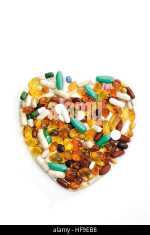 Pills formata a forma di cuore Foto Stock