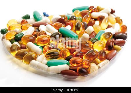 Pills formata a forma di cuore Foto Stock