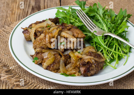 Fegato di vitello con rucola guarnire Foto Stock