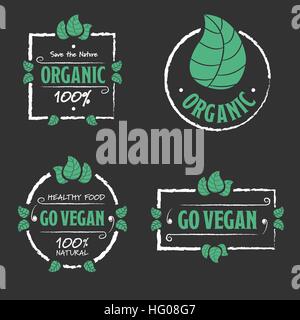 Alimenti biologici Go vegan set di icone con foglie su sfondo nero Illustrazione Vettoriale
