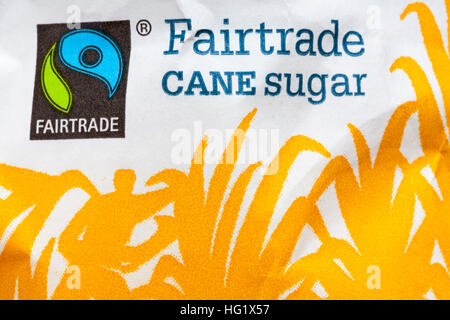 Fairtrade logo lo zucchero di canna sul pacchetto di Tate and Lyle Fairtrade zucchero semolato - Fairtrade simbolo logo del commercio equo e solidale Foto Stock