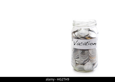 Monete metalliche isolate in vaso con etichetta di vacanza - concetto finanziario Foto Stock
