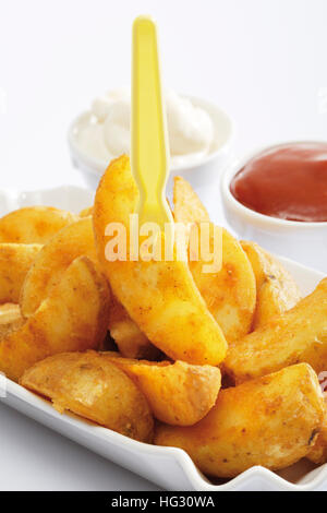 Spicchi di patate Foto Stock