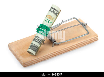 Rotolo di dollar banconota in mousetrap isolati su sfondo bianco concetto rischio finanziario Foto Stock