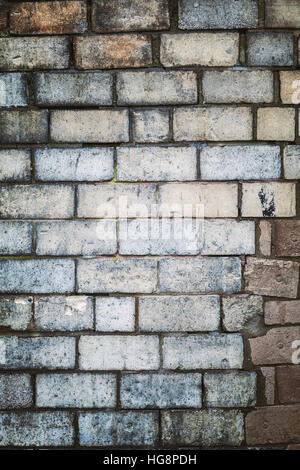 Immagine scura di un muro di mattoni. Abstract background. Foto Stock