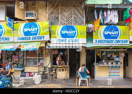 Negozi locali e residenti, Intramuros, Manila, Filippine Foto Stock