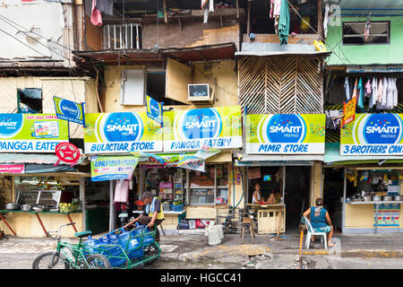 Negozi locali e residenti, Intramuros, Manila, Filippine Foto Stock