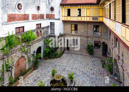 Il cortile di casa Manila, San Luis complessa, Intramuros, Filippine Foto Stock