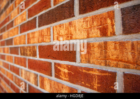 Bellissimo rustico in mattoni a vista in prospettiva, un muro di mattoni dettaglio con profondità di campo Foto Stock