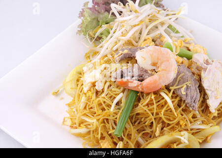 Singapore tagliatelle saltate in padella Foto Stock