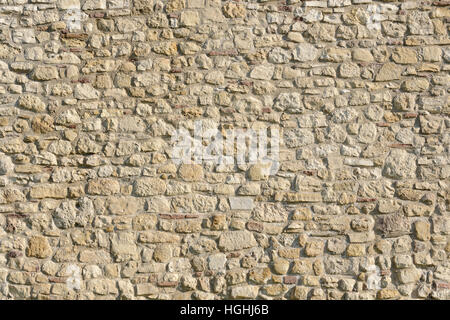 Muro di pietra, vicino. Foto Stock