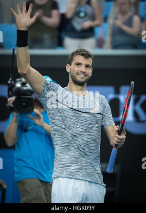 Melbourne, Australia. 23 gen 2017. La Bulgaria Grigor Dimitrov celebra dopo il quarto round match contro Uzbekistan Denis Istomin presso l'Australian Open di Tennis campionati di Melbourne, Australia, 23 gennaio, 2017. Credito: Zhu Hongye/Xinhua/Alamy Live News Foto Stock