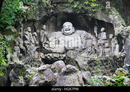 Ridere Buddha, Feilai Feng grotte calcaree Ling Yin tempio Hangzhou Cina Foto Stock