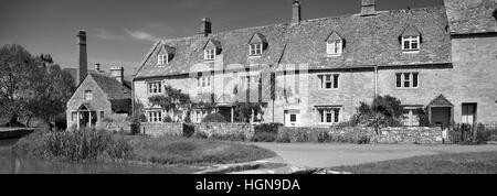 Estate, il vecchio mulino e Cottages, Fiume Windrush, Lower Slaughter village, Gloucestershire Cotswolds, England, Regno Unito Foto Stock