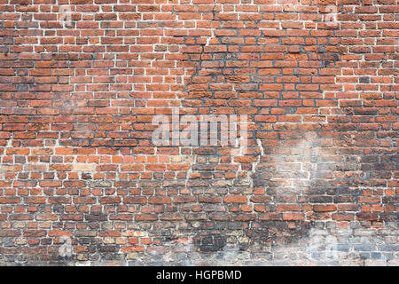 Weathered muro di mattoni per uso in background Foto Stock