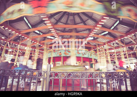 Tono Vintage giostra con motion blur Foto Stock