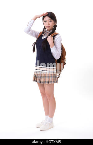 Sorridente high school girl con zaino in posa Foto Stock